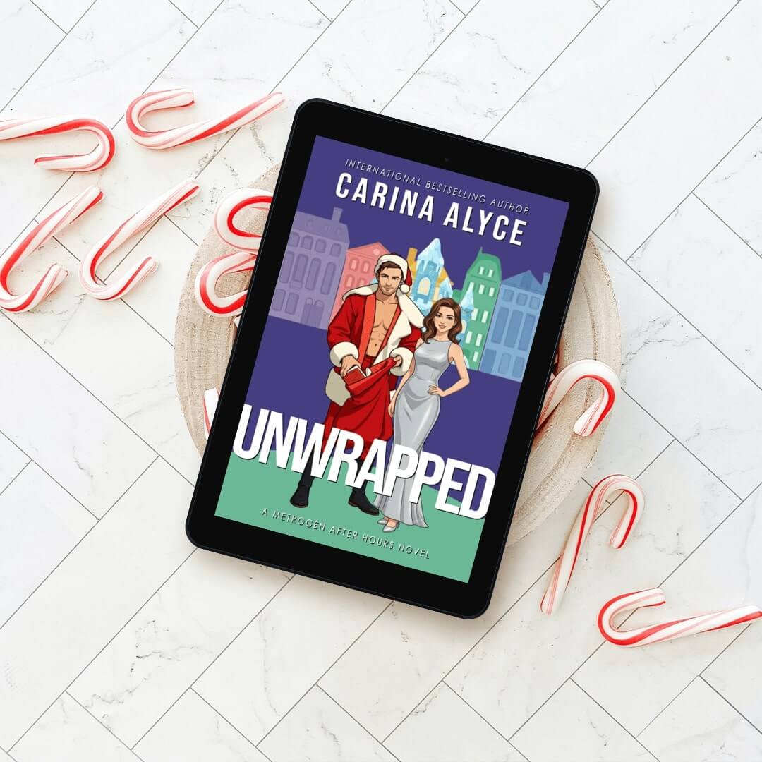 E-reader displaying the cover of 'Unwrapped' by Carina Alyce on a white wooden surface with candy canes.