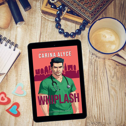 Tablet displaying 'Whiplash' by Carina Alyce on a wooden surface with coffee and accessories.