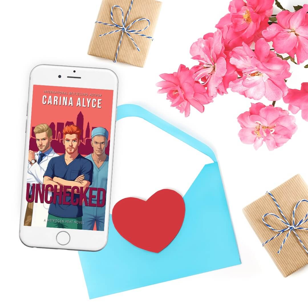 Phone displaying a book cover with flowers and gift boxes on a white background